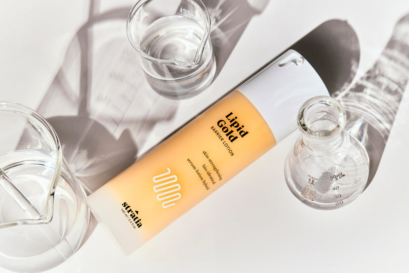 Stratia Lipid Gold Moisturizer with Science Glassware